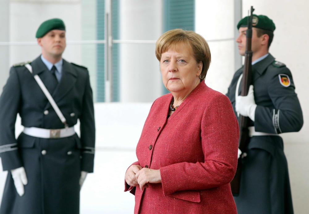 German Chancellor Angela Merkel waits prior to welcome Georgian President for a meeting on February 20, 2019 in Berlin.  AFP / Wolfgang Kumm