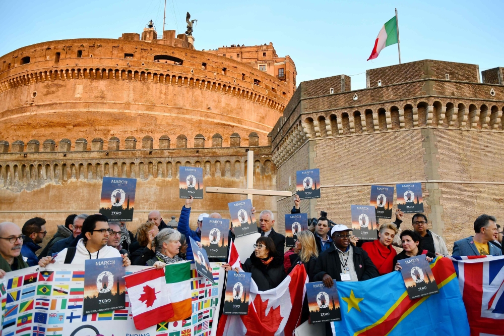 Members of Ending Clergy Abuse (ECA), a global organization of prominent survivors and activists who are in Rome for this week’s papal summit on the sex abuse crisis within the Catholic Church, hold a protest gathering on February 21, 2019 by the Castel S