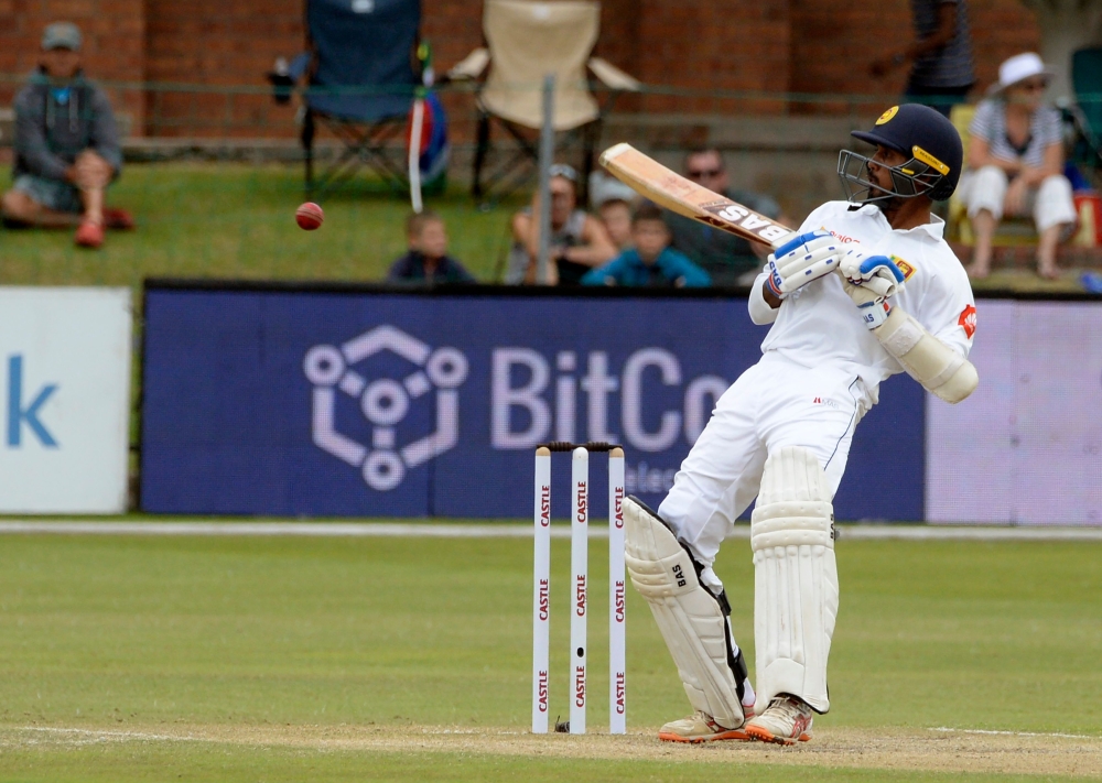 Sri Lanka's Oshada Fernando plays a shot during the third day of the second Test cricket match between South Africa and Sri Lanka at St. George's Park Stadium in Port Elizabeth on February 23, 2019. (AFP / RODGER BOSCH)