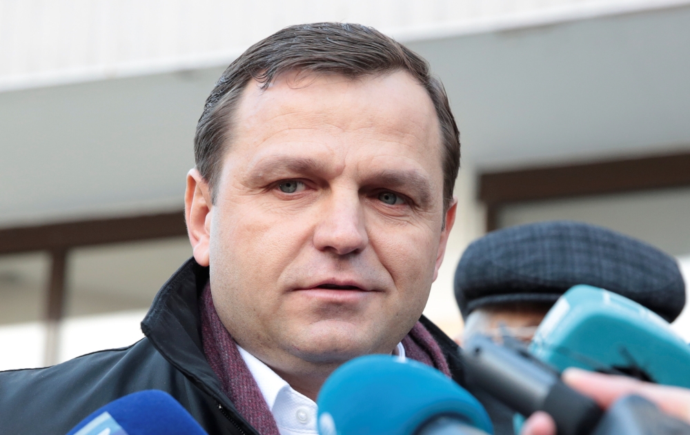 Andrei Nastase, one of the leaders of Moldova's ACUM opposition bloc, addresses the media as he visits a polling station during a parliamentary election in Chisinau, Moldova February 24, 2019. REUTERS/Vladislav Culiomza