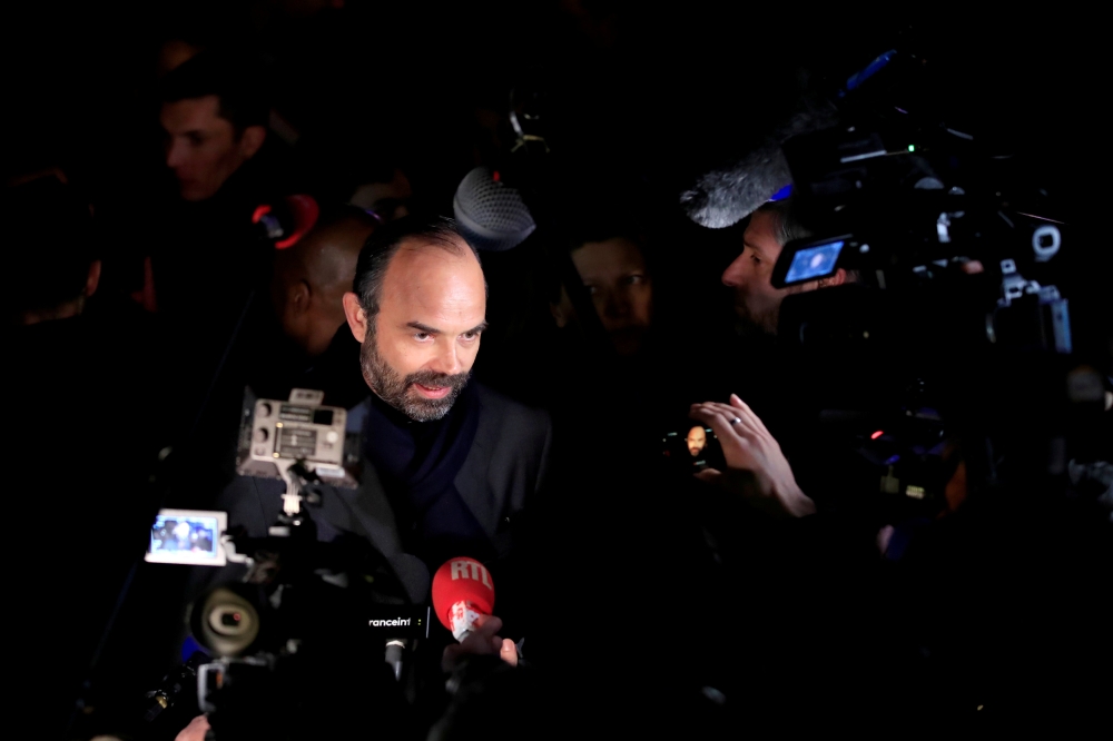 FILE PHOTO: French Prime Minister Edouard Philippe speaks to the media during a national gathering to protest antisemitism and the rise of anti-Semitic attacks in the Place de la Republique in Paris, France, February 19, 2019. REUTERS/Gonzalo Fuentes