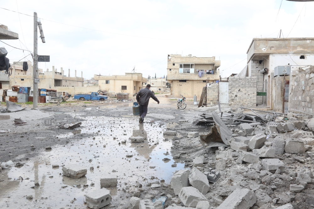 The wreckage of buildings are seen after Assad Regime forces' shelling attacks at Khan Shaykun town on February 24, 2019 in Idlib, Syria. Enes Diyab - Anadolu
