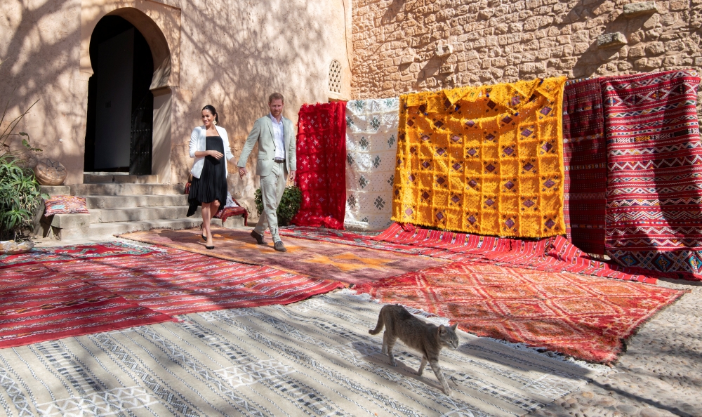 Britain's Meghan, Duchess of Sussex and Prince Harry the Duke of Sussex visit the Andalusian Gardens in Rabat, Morocco February 25, 2019. Facundo Arrizabalaga/Pool via Reuters