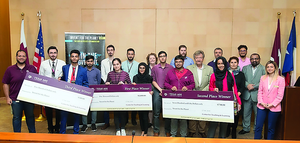 The winners of the competition with the officials. 