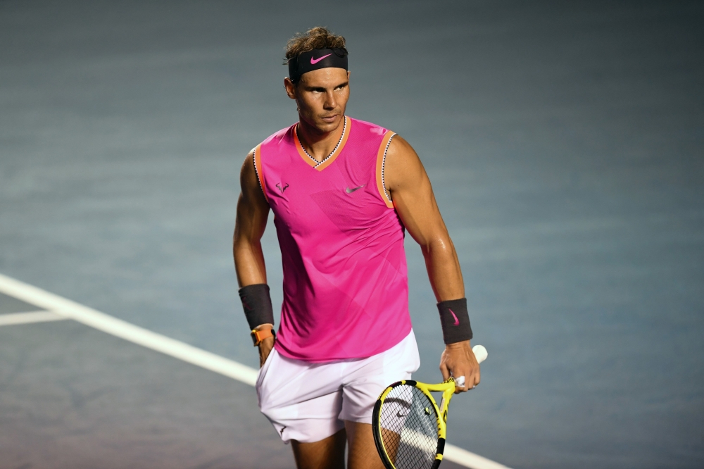 Spanish tennis player Rafael Nadal reacts during a Mexico ATP 500 Open men's single tennis match against Australian tennis player Nick Kyrgios (out of frame) in Acapulco, Guerrero state, Mexico on February 27, 2019. / AFP / PEDRO PARDO