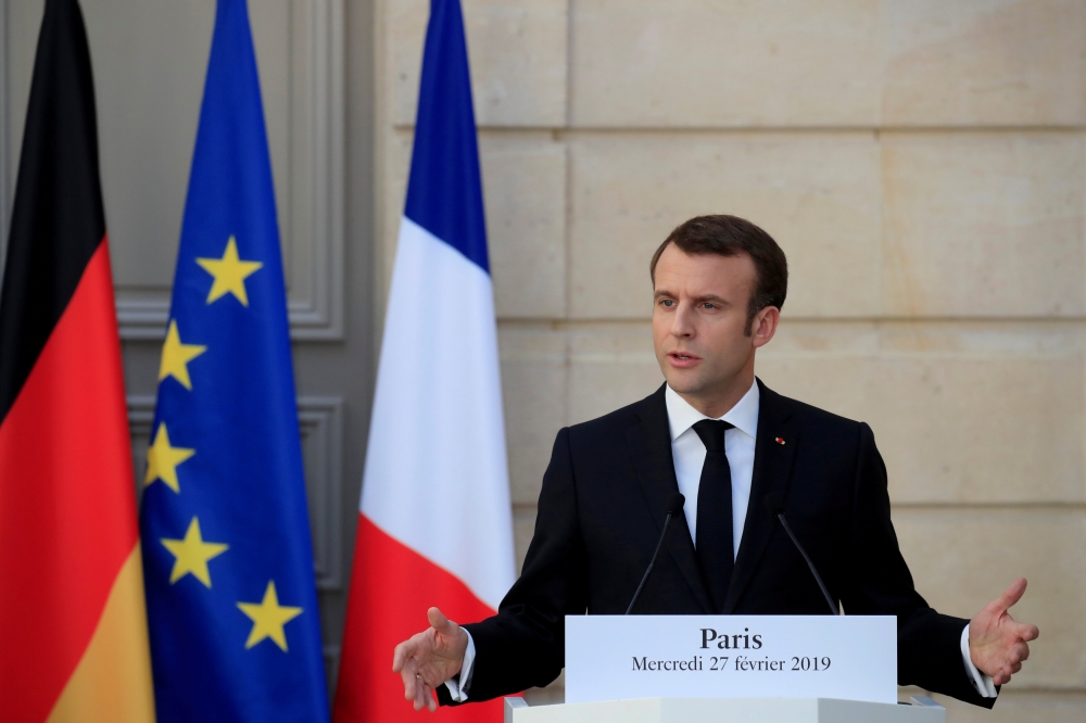 French President Emmanuel Macron and German Chancellor Angela Merkel (not pictured) attend a joint news conference at the Elysee Palace in Paris, France, February 27, 2019. REUTERS/Gonzalo Fuentes