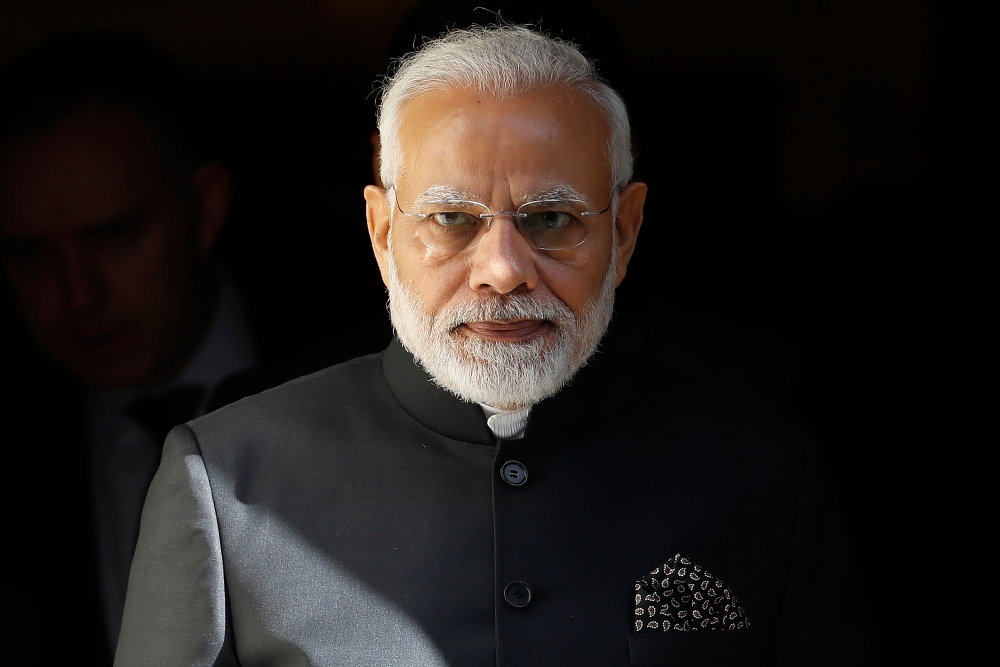 (FILES) A file photo of India's Prime Minister Narendra Modi in central London on April 18, 2018. AFP / Tolga AKMEN