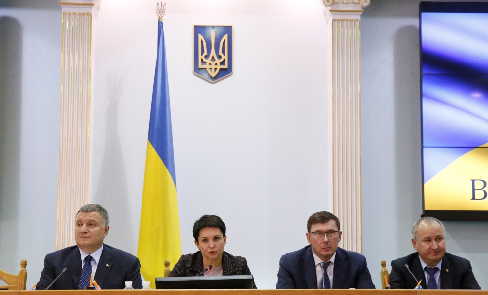 (L-R) Ukraine's Interior Minister Arsen Avakov, head of the Central Election Commission Tetiana Slipachuk, Prosecutor General Yuriy Lutsenko and State Security Service (SBU) chief Vasily Gritsak attend a news briefing on security measures during the upcom