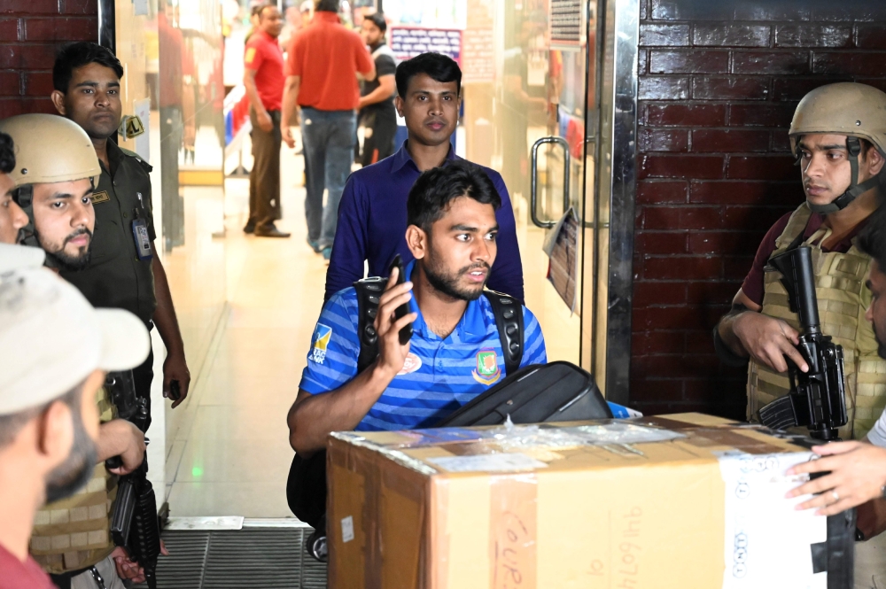 Bangladesh cricketer Mehidy Hasan is seen upon the team's arrival from New Zealand in Dhaka on March 16, 2019, a day after narrowly escaping the mosque attack that killed 49 people in Christchurch. AFP / Munir Uz Zaman 