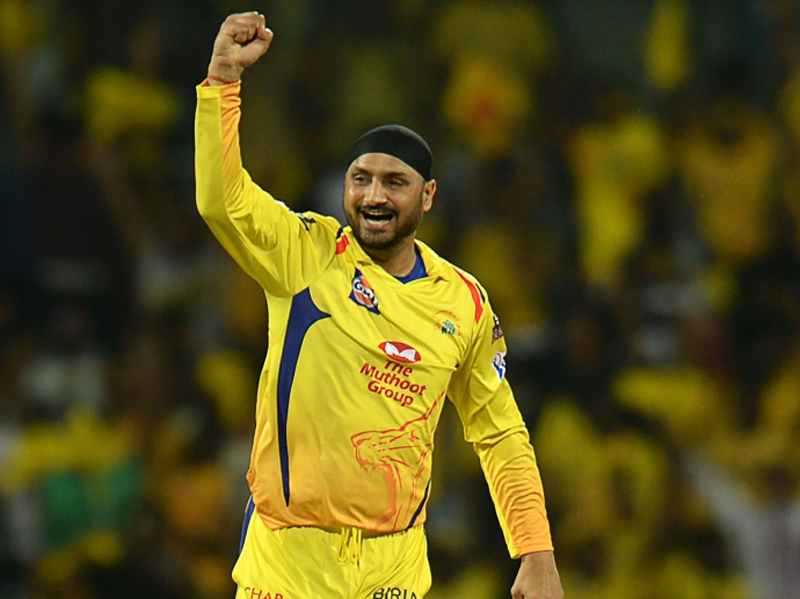 Chennai Super Kings cricketer Harbhajan Singh celebrates a wicket of Royal Challengers Bangalore's Virat Kohli during the Indian Premier League (IPL) Twenty20 cricket match between Chennai Super Kings and Royal Challengers Bangalore at the M. A. Chidhamba