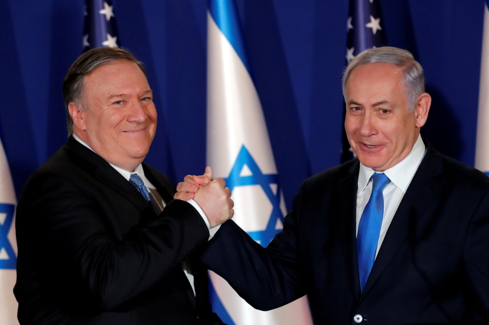US Secretary of State Mike Pompeo shake hands with Israeli Prime Minister Benjamin Netanyahu, during their visit at Netanyahu's official residence in Jerusalem March 21, 2019. Reuters/Jim Young