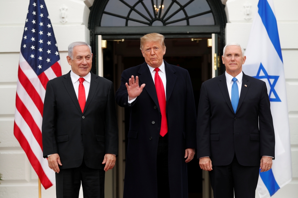 US President Donald Trump welcomes Israel Prime Minister Benjamin Netanyahu with Vice President Mike Pence at the White House, March 25, 2019. Reuters/Carlos Barria