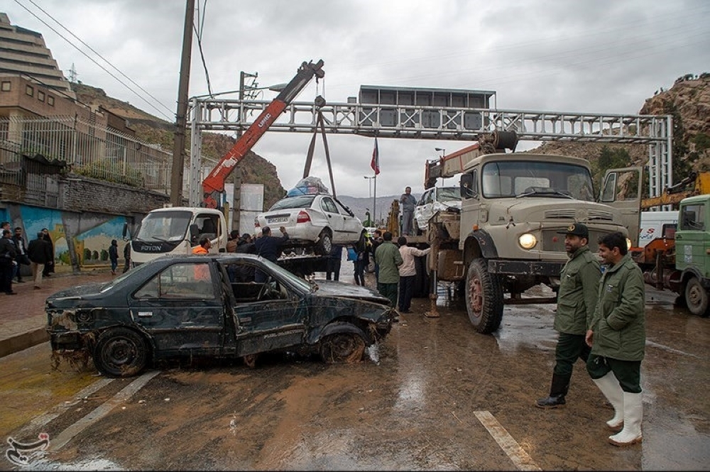 Damaged vehicles are seen after a flash flooding In Shiraz, Iran, March 25, 2019. Tasnim News Agency/Handout via REUTERS 