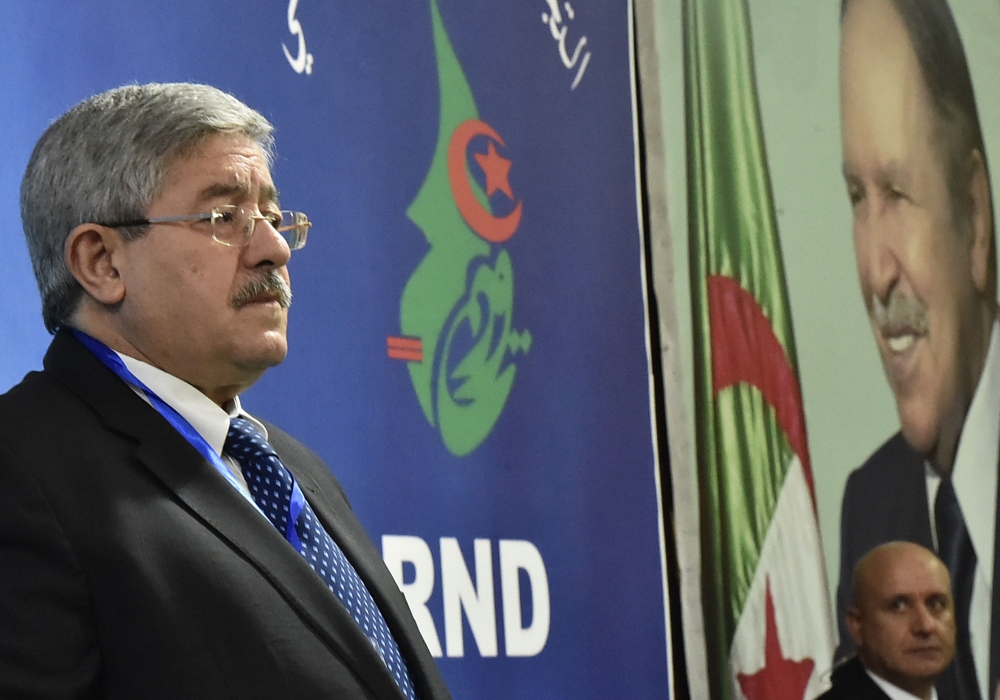 Algerian Prime Minister Ahmed Ouyahia addressing an ordinary session of The National Rally for Democracy (RND) political party, in Zeralda near the capital Algiers.   AFP / RYAD KRAMDI
