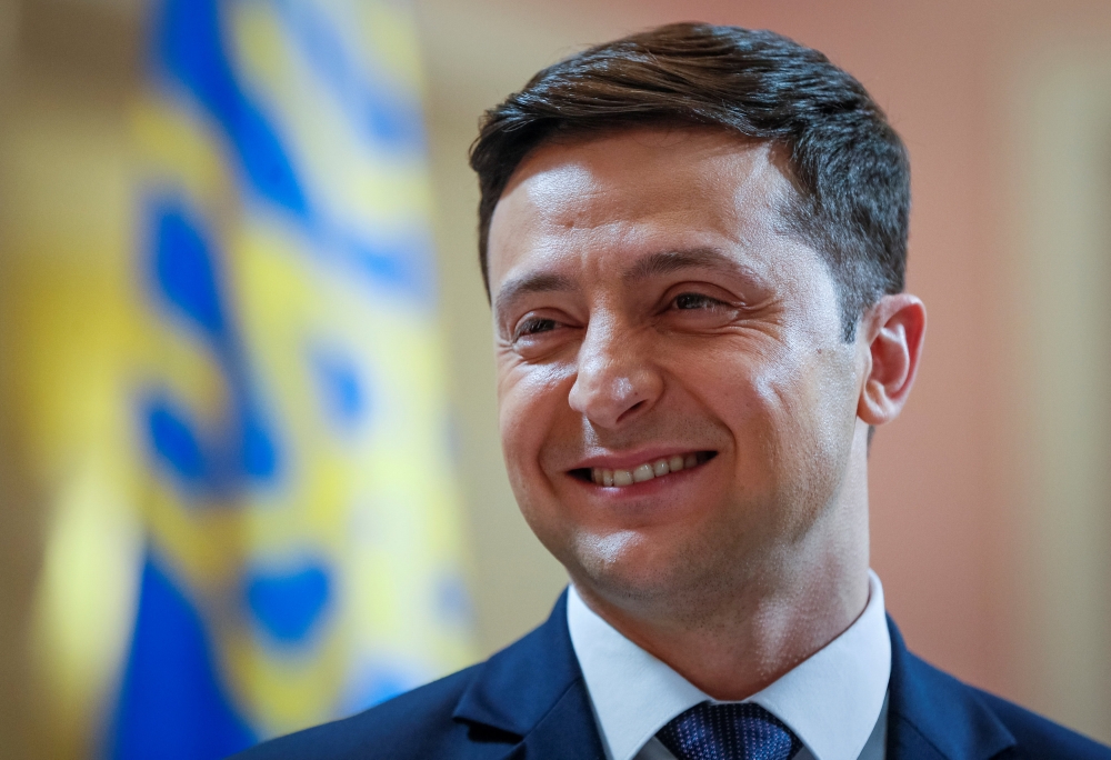 FILE PHOTO: Volodymyr Zelenskiy, Ukrainian comic actor and candidate in the upcoming presidential election, takes part in a production process of Servant of the People series in Kiev, Ukraine March 6, 2019. REUTERS/Valentyn Ogirenko
