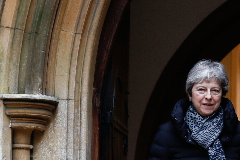Britain's Prime Minister Theresa May leaves after attending a church service, near her Maidenhead constituency, west of London on March 31, 2019. AFP / Adrian Dennis 