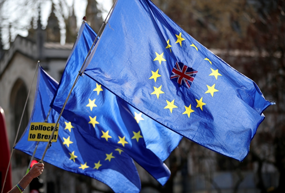 Anti-Brexit protesters demonstrate outside the Houses of Parliament in London, Britain April 1, 2019. REUTERS/Hannah McKay