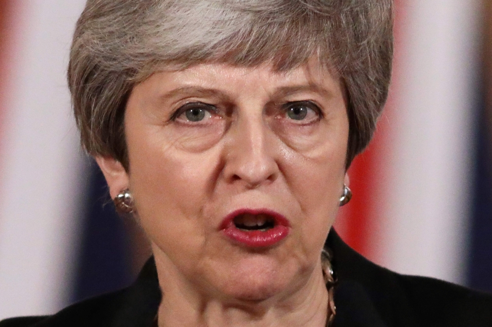 Prime Minister Theresa May gives a statement inside 10 Downing Street in London, Britain, on April 2, 2019 after chairing a day-long meeting of the cabinet. AFP /Jack Taylor 