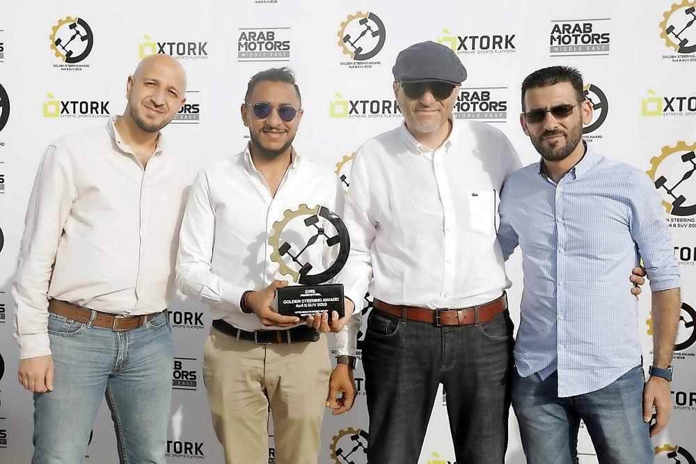 The representatives of Mitsubishi Montero Sport with the “Best Mid-Size 4x4” Award from Golden Steering Awards-Qatar 2019. 