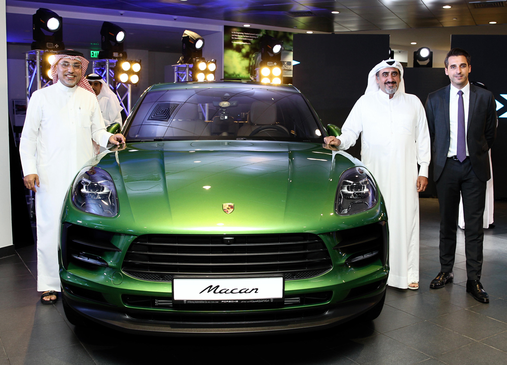 Salman Jassem Al Darwish, Chairman and CEO of Porsche Centre Doha, and other officials at the launch of the all new Macan at the Porsche Centre in The Pearl-Qatar yesterday. 
Pic: Qassim Rahmatullah / The Peninsula. 