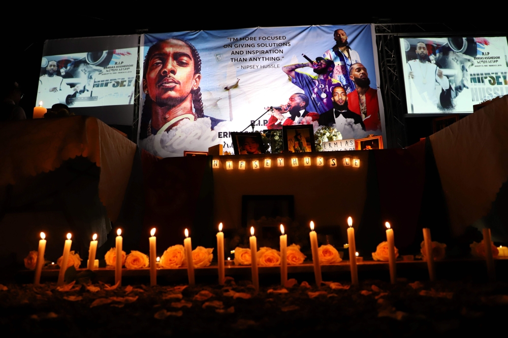 Dozens of Ethiopian and Eritrean living in Addis Ababa gather for the memorial service to honor Eritrean American rapper, Nipsey Hussle, on April 6, 2019 in Addis Ababa.  AFP / Michael TEWELDE