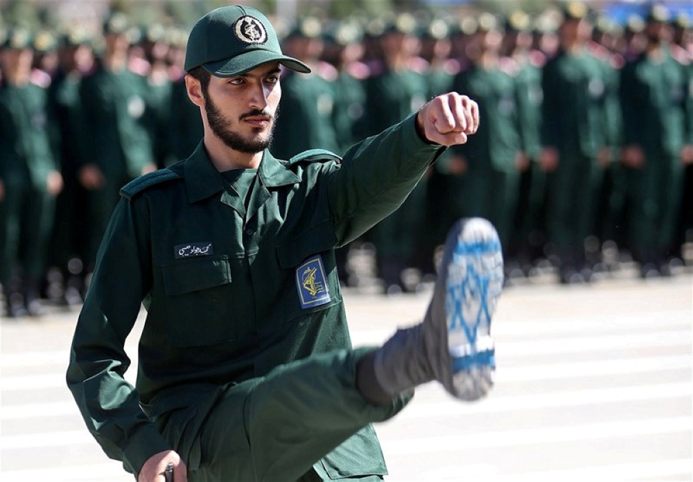 An Iranian Officer of Revolutionary Guards, with Israel flag drawn on his boots, is seen during graduation ceremony, held for the military cadets in a military academy, in Tehran, Iran June 30, 2018. Tasnim News Agency/via Reuters