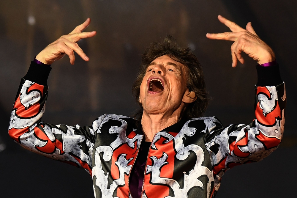 British musician Mick Jagger of The Rolling Stones performs during a concert at The Velodrome Stadium in Marseille on June 26, 2018, as part of their 'No Filter' tour.  AFP / Boris Horvat
 