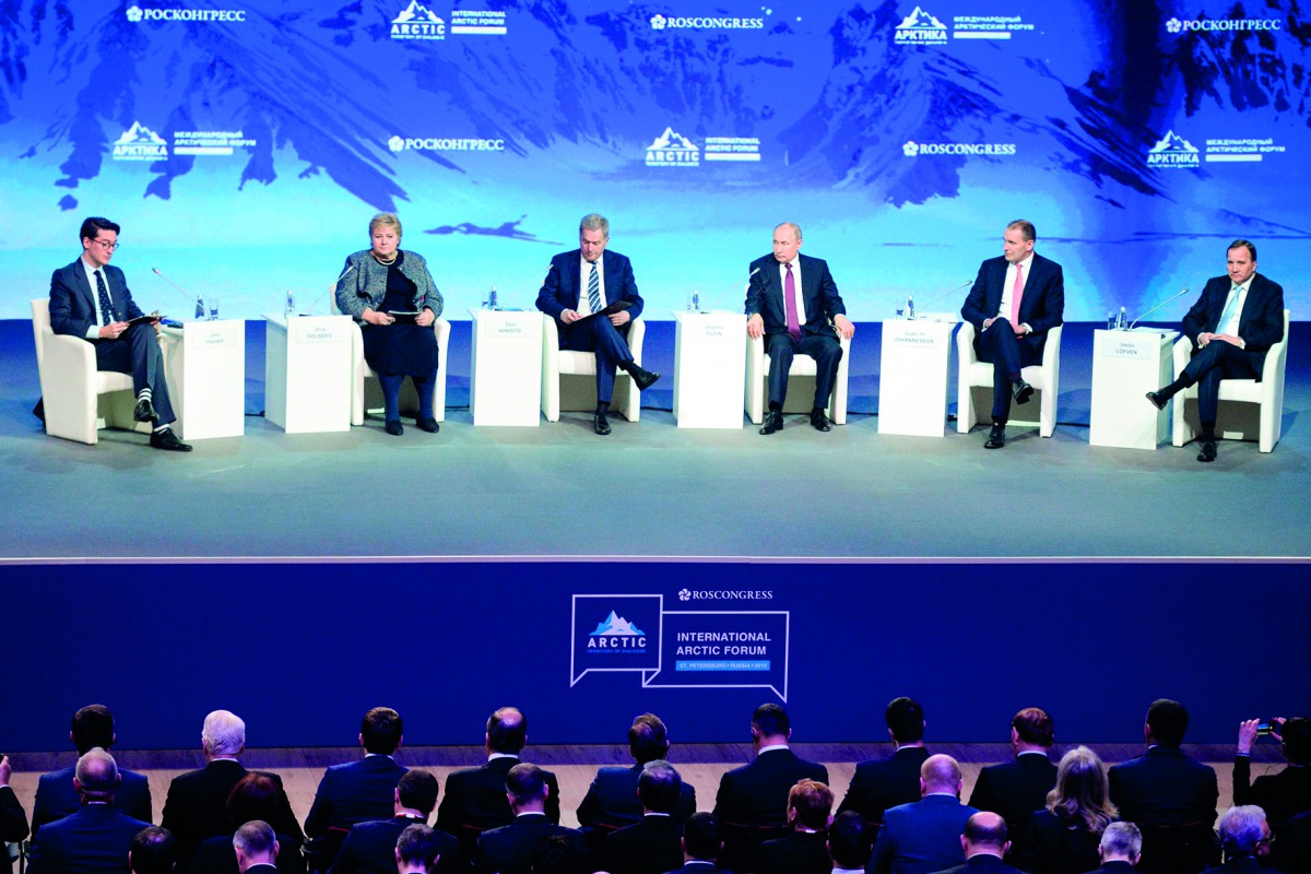 Sweden's Prime Minister Stefan Lofven, Iceland's President Gudni Johannesson, Russia's President Vladimir Putin, Finland's President Sauli Niinisto, Norway's Prime Minister Erna Solberg and moderator Bloomberg's Senior Executive Editor for Global Business