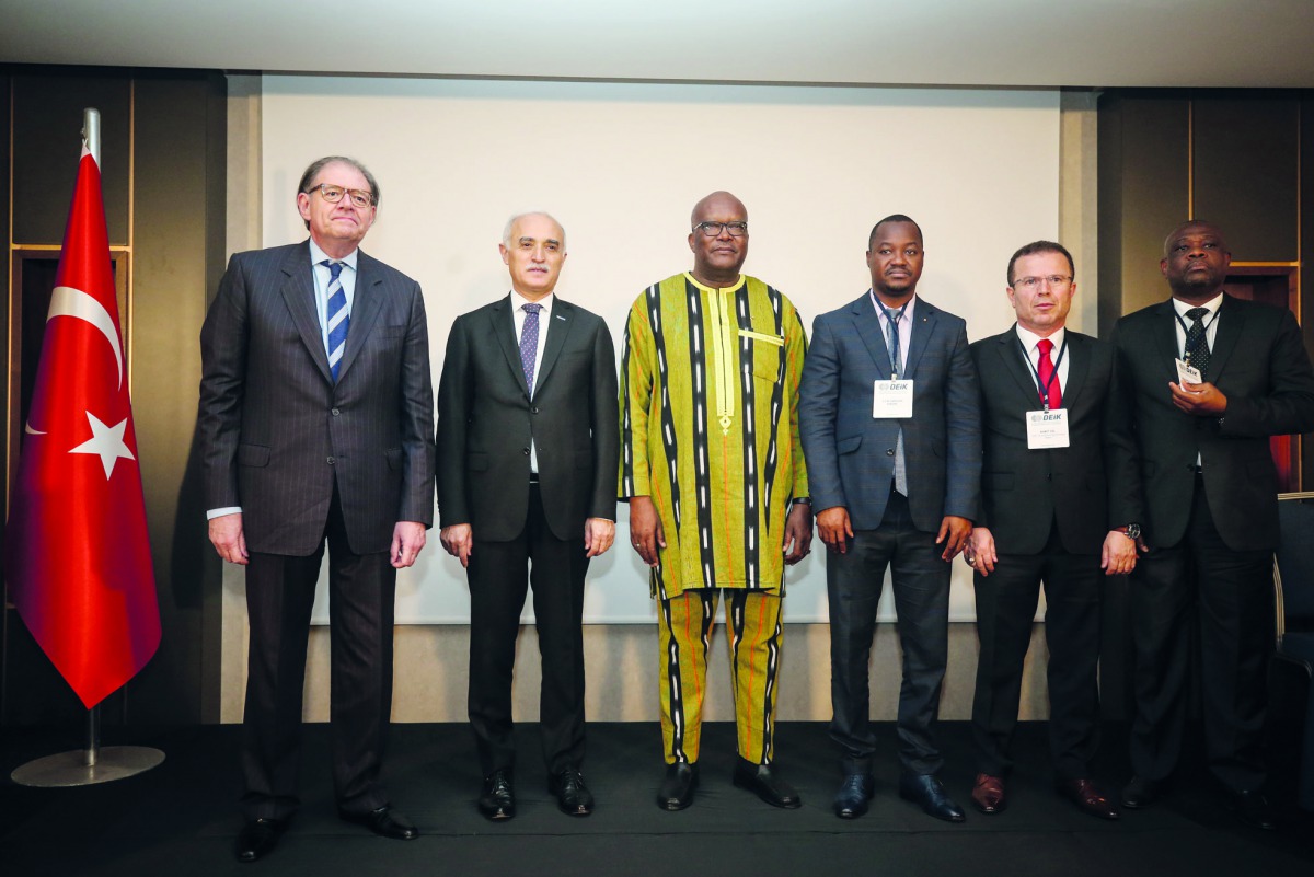  Nail Olpak (2nd L), the chairman of the Foreign Economic Relations Board of Turkey (DEIK), President of Burkina Faso Roch Marc Christian Kabore (C), Minister of Commerce, Industry and Handicrafts of Burkina Faso Harouna Kabore (3rd R) and Minister of Ind