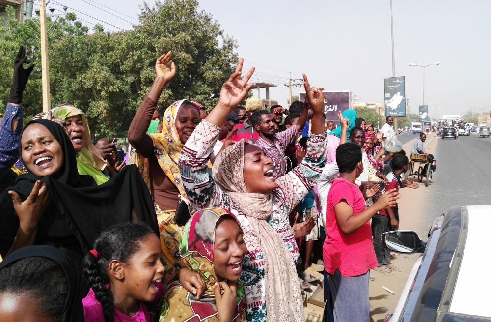 Sudanese people chant slogans on April 11, 2019 in the capital Khartoum. (AFP)