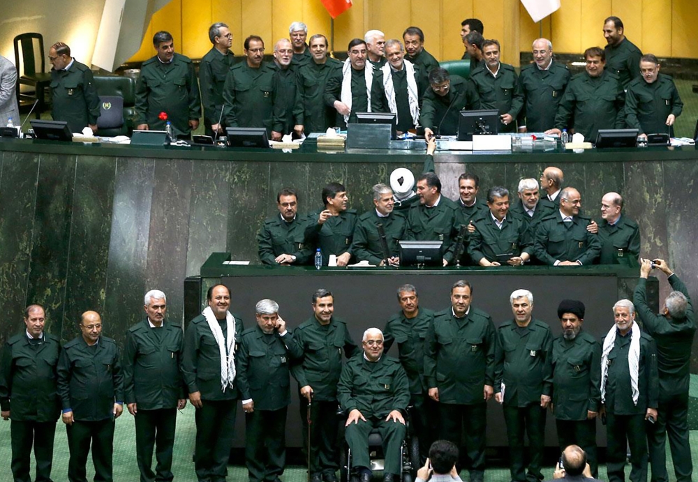 Iranian MPs wearing the outfits of the Islamic Revolutionary Guards Corp (IRGC) during a parliamentary session at the Islamic Consultative Assembly in Tehran on April 9 2019.  AFP 
