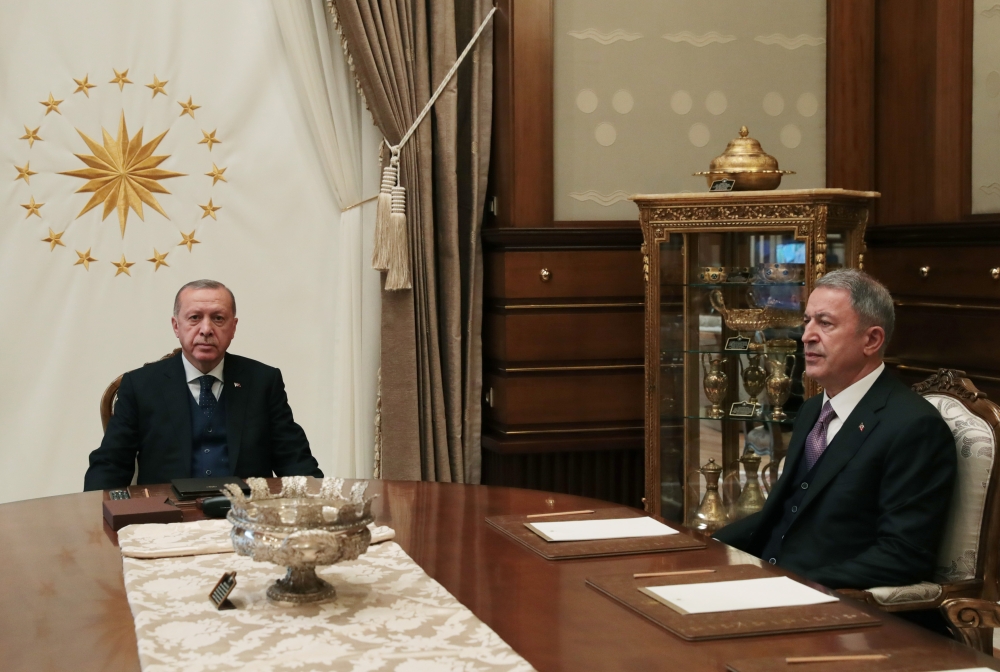 Turkish President Recep Tayyip Erdogan meets Turkish National Defense Minister Hulusi Akar at Presidential Complex in Ankara, on April 11, 2019. (Turkish Presidency/Murat Cetinmuhurdar/Anadolu Agency ) 