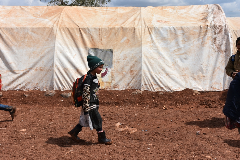 Students leave school after classes finish in the Shuhada Miskan refugee camp in Azaz region, Syria on April 8, 2019. Meryem Gökta? - Anadolu
