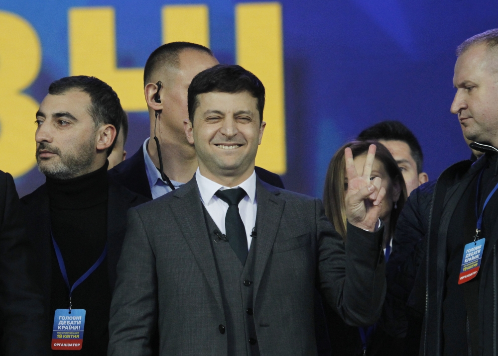 Ukrainian presidential candidate Volodymyr Zelensky (C) gestures during a debate with Ukrainian President and presidential candidate Petro Poroshenko (not seen) at the Olimpiyskiy Stadium in Kiev, Ukraine on April 19, 2019. Vladimir Shtanko - Anadolu 