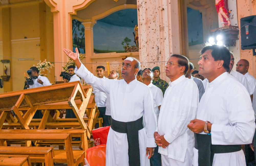 Sri Lankan President Maithripala Sirisena (2nd R) visits the St. Sebastian Church after the multiple terror attacks in Negombo, Sri Lanka on April 23 , 2019. The Presidential Office of Sri Lanka