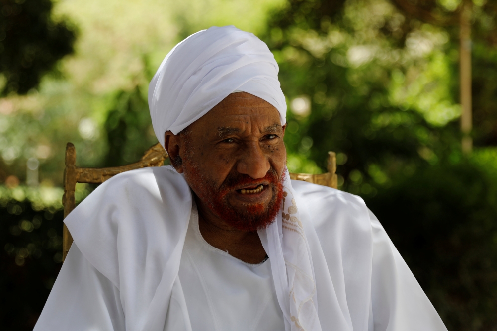 Leading Sudanese opposition figure Sadiq al-Mahdi, Sudan's last democratically elected prime minister, who was overthrown in 1989 in a bloodless coup by army officer Omar Hassan al-Bashir, talks during an interview with Reuters in Khartoum, Sudan, April 2