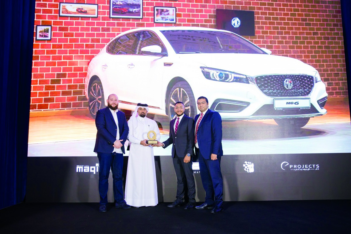 Officials receiving the award.