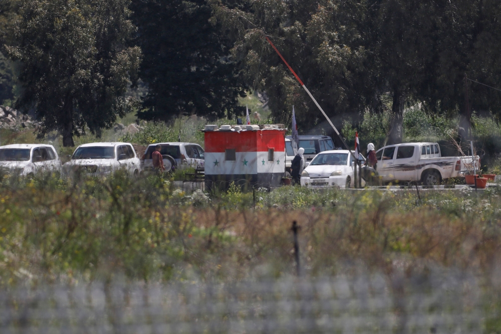 A general view taken on April 28, 2019 shows the Quneitra crossing in the Israeli annexed-Golan Heights during the transfer of two Syrian prisoners from Israel to Syria. AFP / JALAA MAREY

