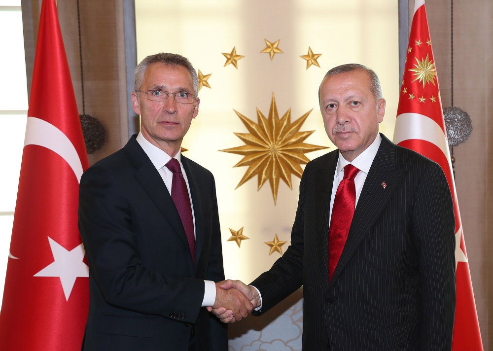 Turkish President Recep Tayyip Erdogan (R) shakes hands with NATO Secretary General Jens Stoltenberg as they pose for a photograph prior to their meeting at the Cankaya Palace in the capital Ankara, on May 06, 2019. AFP 