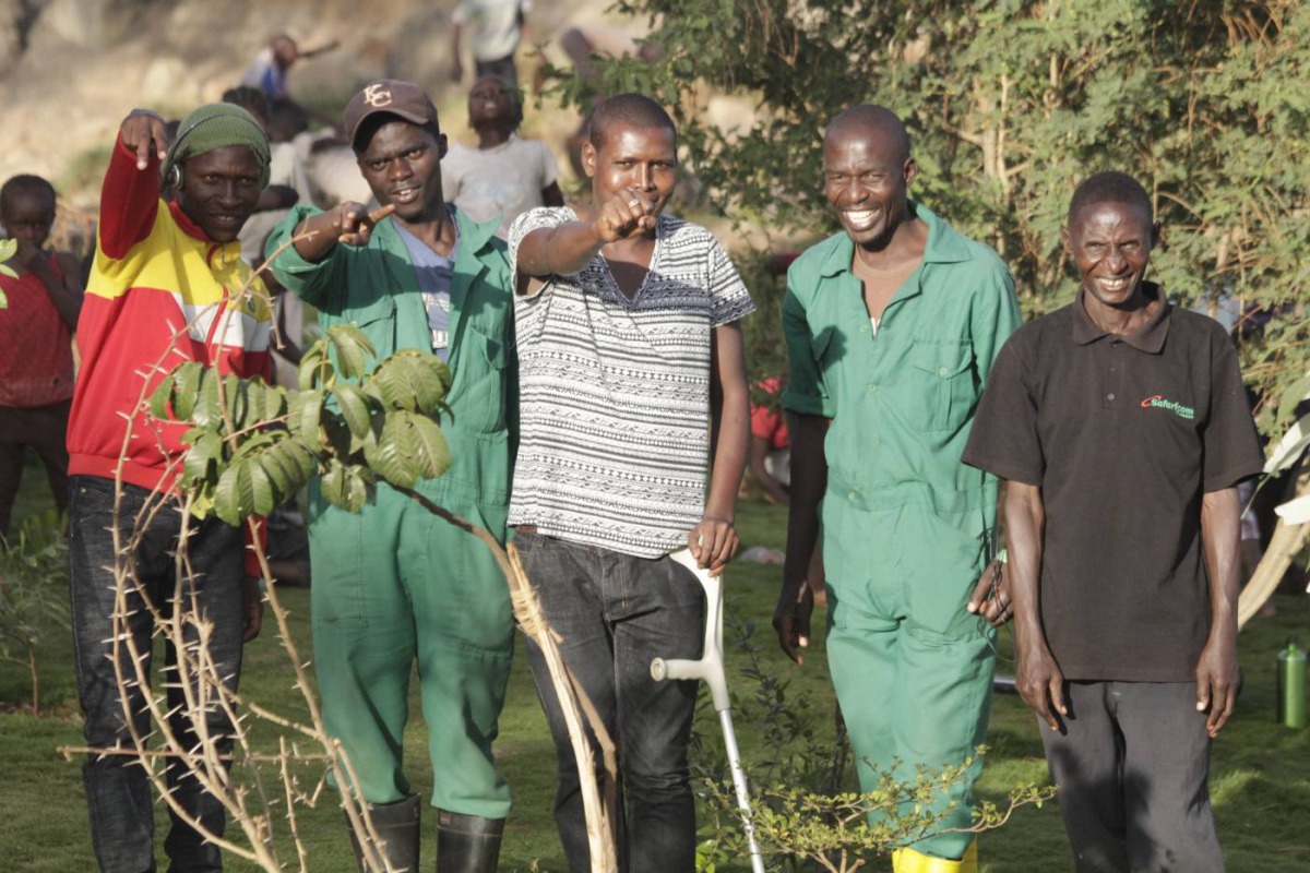 Members of Komb Green Solutions pose for a picture in Korogocho, Kenya on March 27, 2019. Thomson Reuters Foundation/Thomas Bwire