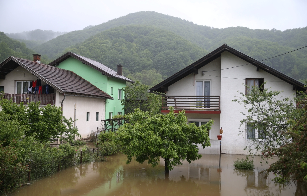 Flooded houses are seen in Teslic, Bosnia and Herzegovina May 14, 2019. REUTERS/Dado Ruvic