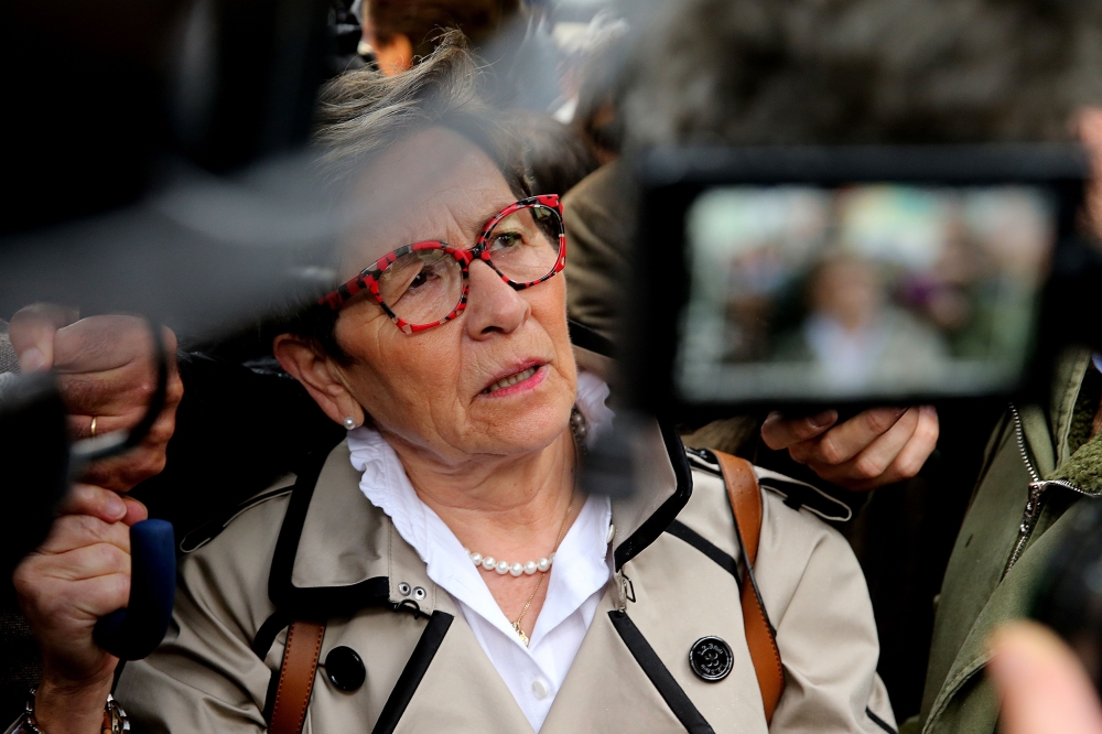 The mother of French quadriplegic Vincent Lambert, Viviane Lambert, speaks to the press as she arrives with members of a support committee in the Sebastopol hospital in Reims, eastern France, on May 19, 2019. AFP / FRANCOIS NASCIMBENI