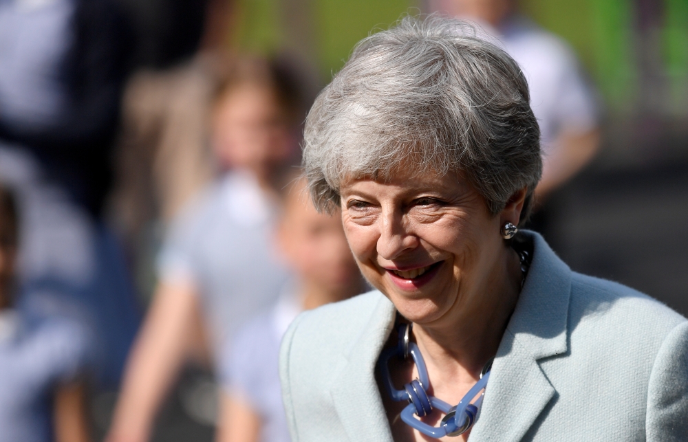 Britain's Prime Minister Theresa May arrives to vote in the European Parliament Elections, taking place despite Brexit uncertainty, in Sonning, Britain, May 23, 2019. REUTERS/Toby Melville