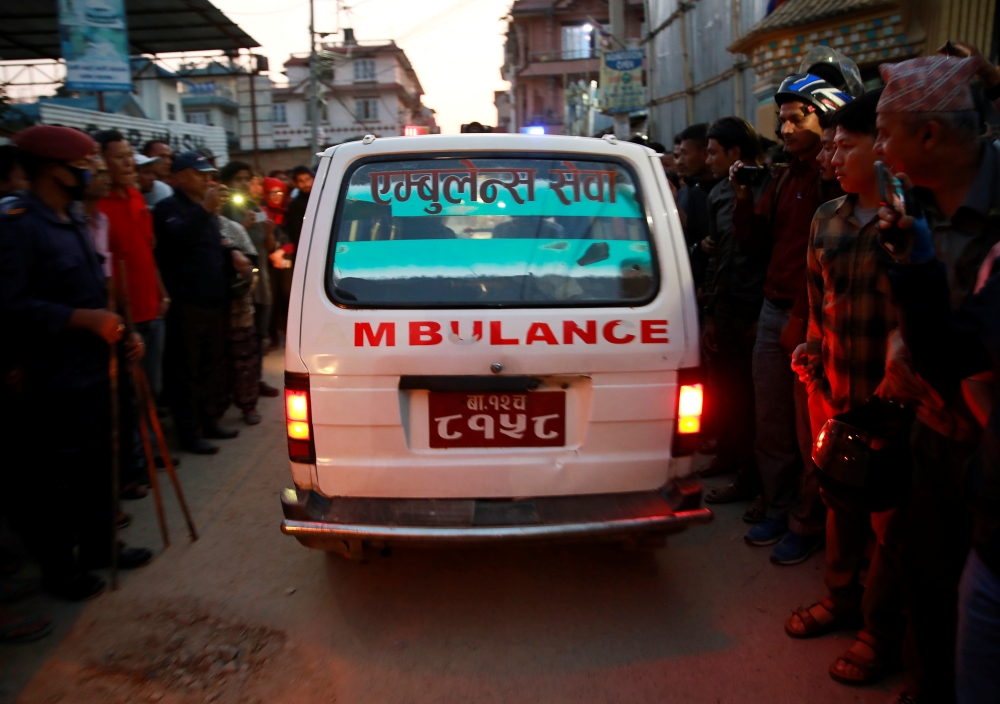 An ambulance carrying a victim's body leaves an explosion site in Kathmandu, Nepal May 26, 2019. REUTERS/Navesh Chitrakar