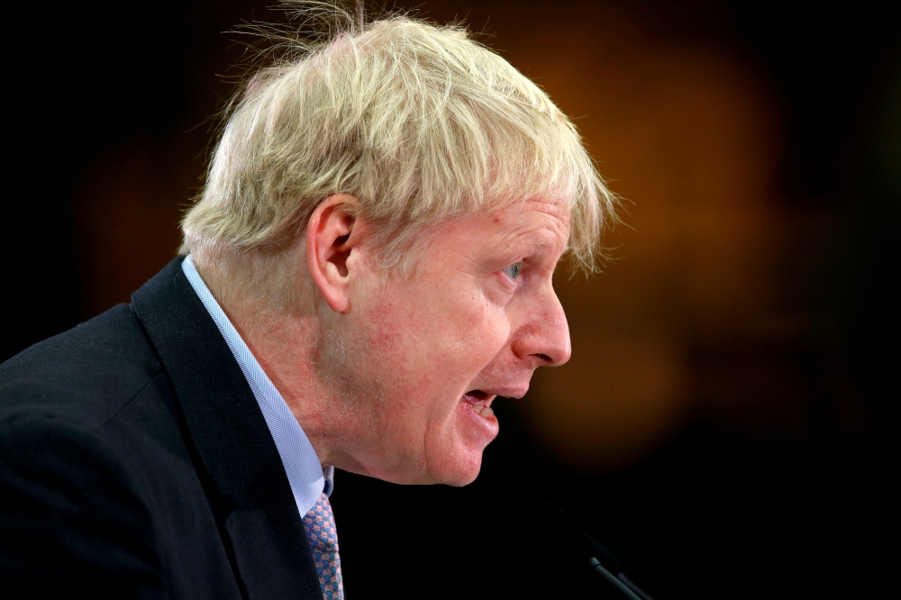 FILE PHOTO: Former British Foreign Secretary Boris Johnson gives a speech at the JCB Headquarters in Rocester, Staffordshire, Britain, January 18, 2019. REUTERS/Andrew Yates