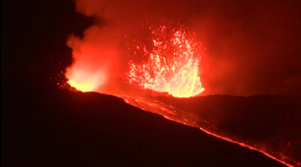 This video grab released by AFPTV shows the Mount Etna, Europe's biggest active volcano, erupting, on May 31, 2019 near Catania, due to the opening of two eruptive fractures according to the volcanologists of the Ingv Etna Observatory. / AFP / AFPTV / Ale