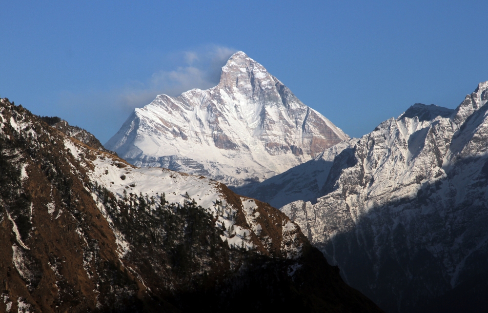 Snow-covered Nanda Devi mountain is seen from Auli town, in the northern Himalayan state of Uttarakhand, India February 25, 2014. REUTERS
