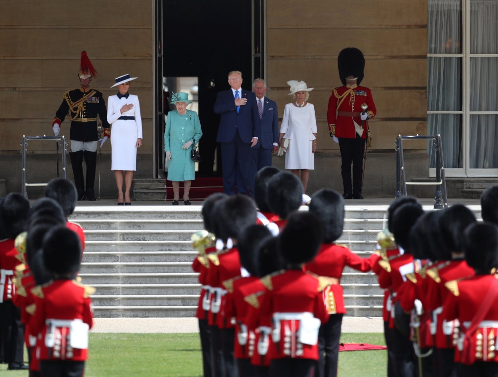 U.S. President Donald Trump and First Lady Melania Trump attend a welcome ceremony with Britain's Prince Charles and Camilla, Duchess of Cornwall, at Buckingham Palace, in London, Britain, June 3, 2019. REUTERS/Simon Dawson/Pool