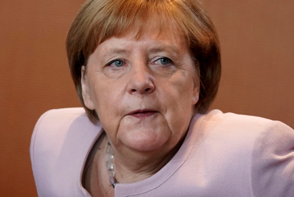 FILE PHOTO: German Chancellor Angela Merkel attends the cabinet meeting in Berlin, Germany, June 6, 2019. REUTERS/Fabrizio Bensch