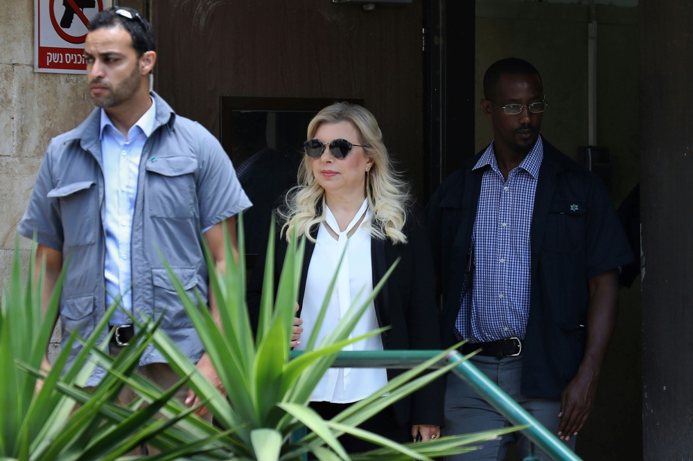 Sara Netanyahu, wife of Israeli Prime Minister Benjamin Netanyahu, leaves the Magistrate's Court in Jerusalem on June 16, 2019, following her conviction of fraudulently using state funds for meals. AFP / GALI TIBBON